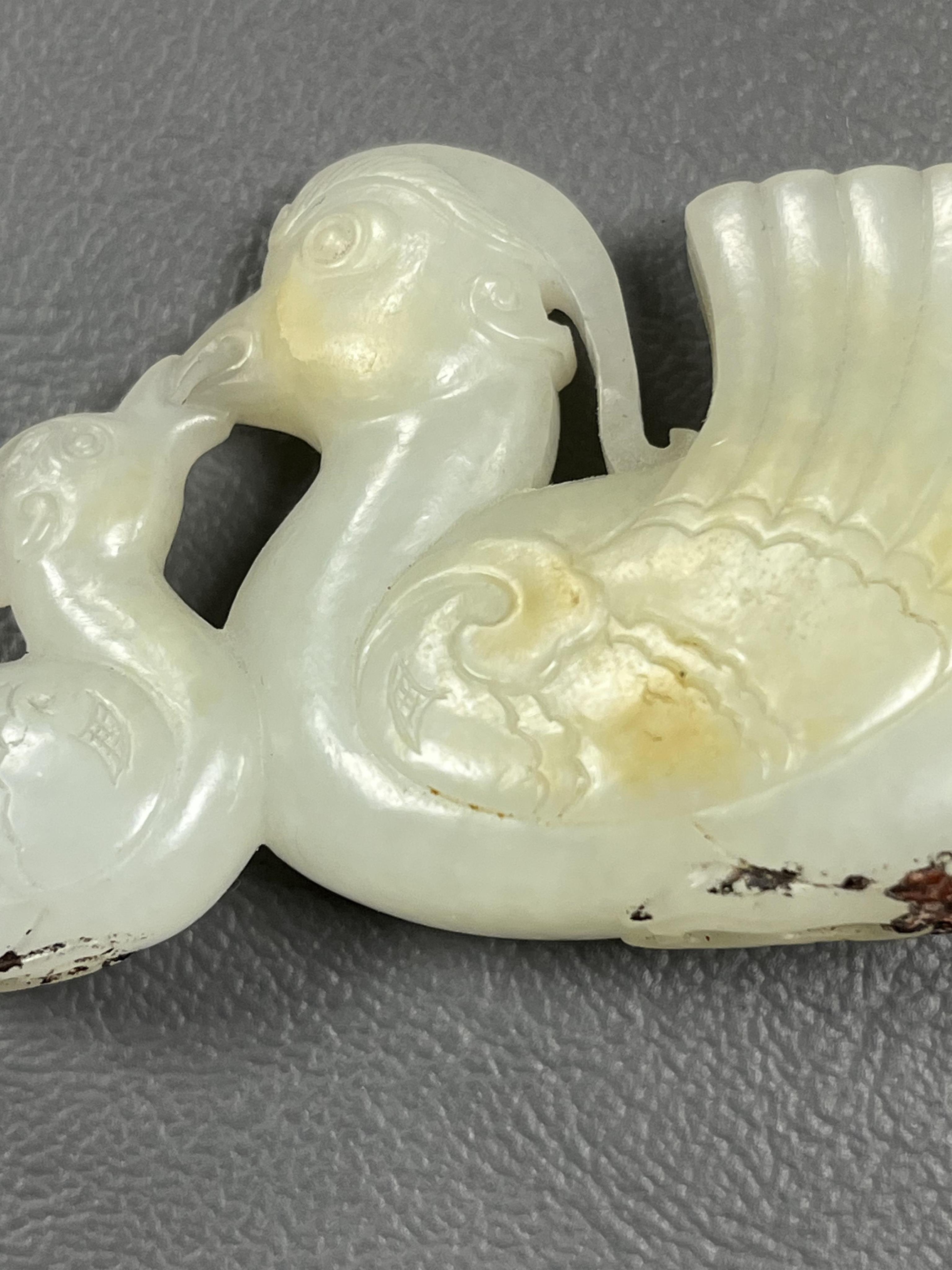 A Chinese white jade mandarin duck group, 18th/19th century